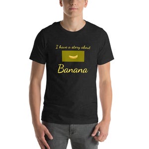 May include: A black t-shirt with a yellow banana graphic and the text "I have a story about Banana".
