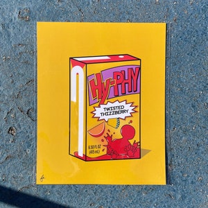 May include: A yellow and red cartoon illustration of a juice box with the text "Hy-Phy" and "Twisted Thizzberry". The juice box is 6.50 fl oz (415 ml).