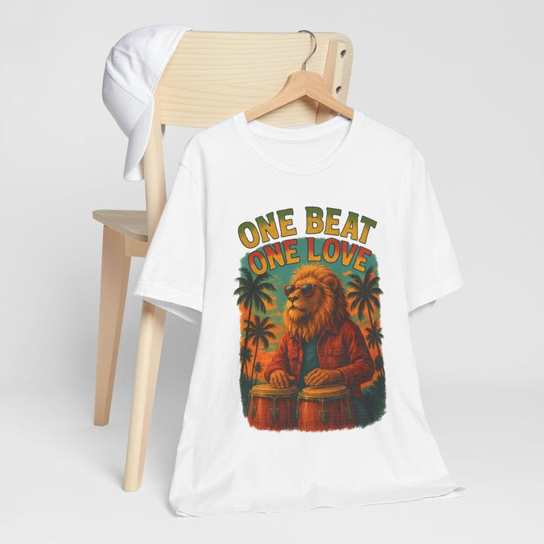 Camiseta gráfica vibrante para amantes de la música: Camiseta unisex "One Beat One Love" imagen 1