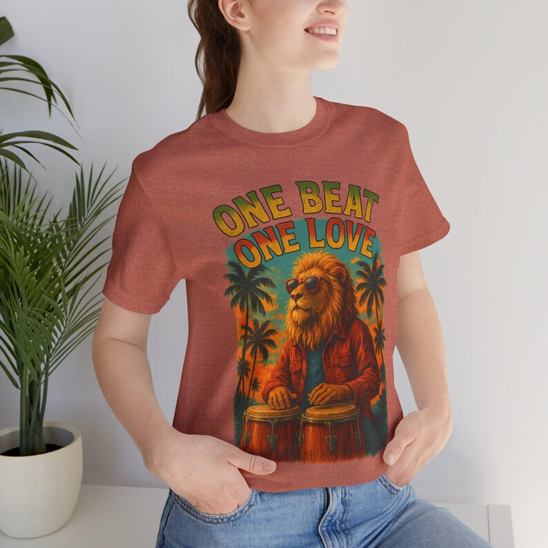 Camiseta gráfica vibrante para amantes de la música: Camiseta unisex "One Beat One Love" imagen 2