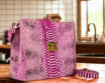 Handcrafted pink snakeskin shoulder bag