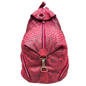 May include: A red snakeskin backpack with silver hardware and zipper closures.