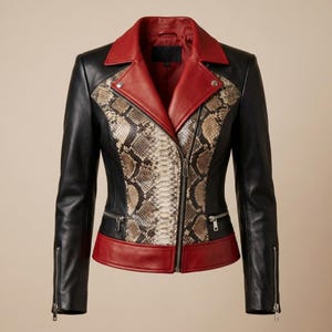 May include: A black leather jacket with a red collar and trim, and a snakeskin-patterned front panel. The jacket has a zip closure, side pockets, and zips on the sleeves. A fashionable outerwear item.