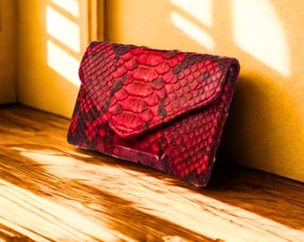 Pochette da giorno in pelle di serpente da portare a mano, ideale come regalo per la mamma