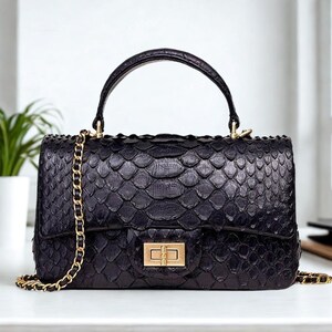 Bolsos de hombro y carteras de diseño de piel de serpiente