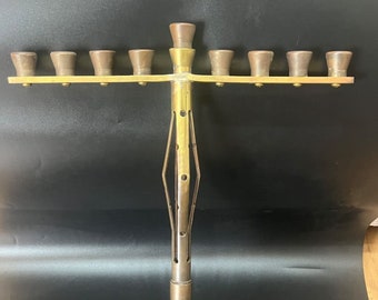 Judaica, Trench Art - A rare and unique Hanukkah lamp menorah created from an Israeli military shell