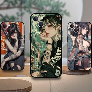 May include: Three phone cases with anime-style illustrations. The cases feature images of a woman with tattoos, in various poses. The artwork has a Japanese aesthetic, with detailed backgrounds and vibrant colors. The cases are black and have camera cutouts.