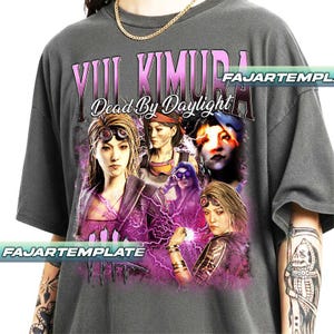 May include: Dark gray t-shirt featuring a graphic of Yui Kimura from Dead by Daylight. The design includes multiple character portraits with a purple lightning effect and the text "YUI KIMURA" and "Dead By Daylight".