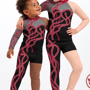 May include: Two long-sleeved athletic tops and leggings sets featuring a black base with a red snake pattern and glitter-effect print. The tops have grey and beige sleeves, and the leggings have one solid-coloured leg. Text reads MAX(XX)ART, NOT REAL GLITTER, SOLD SEPARATELY.