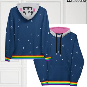 May include: A blue hoodie with a starry pattern and a rainbow stripe at the bottom. The hood features a pixelated face design and a pink interior. The text "MAX(XX)ART" is visible in the top right corner.