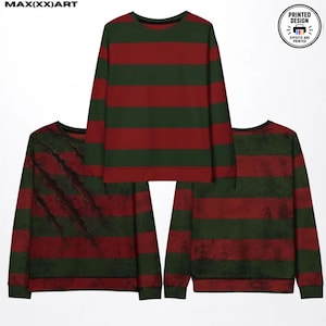 May include: Three long-sleeve crewneck sweatshirts featuring horizontal dark red and forest green stripes. One sweatshirt displays a claw mark graphic, while another shows a distressed, weathered texture. Text reads MAX(XX)ART and PRINTED DESIGN.