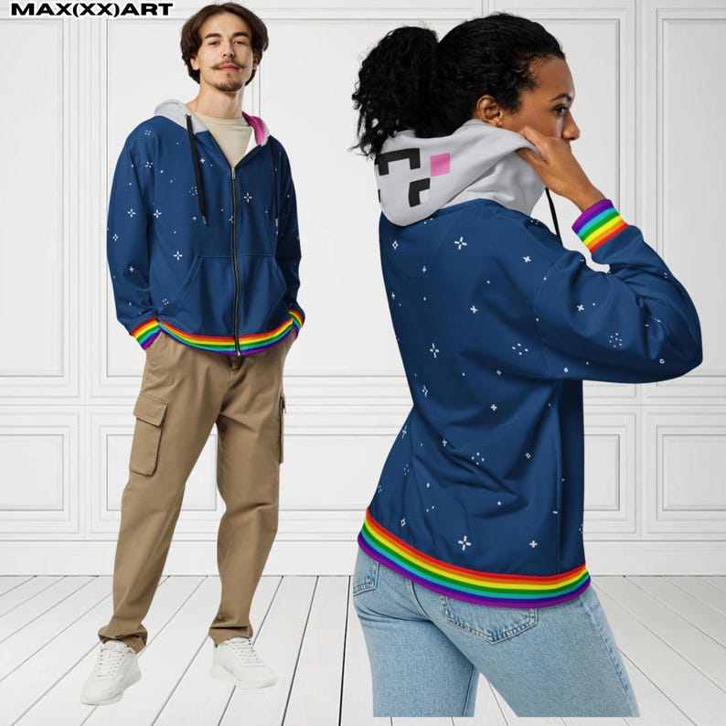 May include: A navy blue zip-up hoodie with a white and gray hood featuring a pixelated design. The hoodie has a rainbow trim at the bottom and on the cuffs, and a pattern of white stars. The text "MAX(XX)ART" is visible at the top.