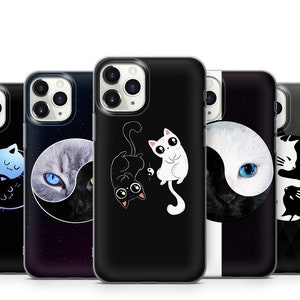 May include: Set of five black phone cases with different designs featuring black and white cats and yin yang symbols.