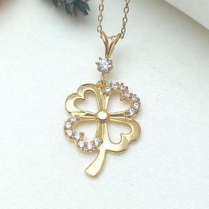 gold clover necklace, clover charm pendant, lucky clover jewelry, four-leaf clover necklace, gold clover charm, dainty clover pendant, gift