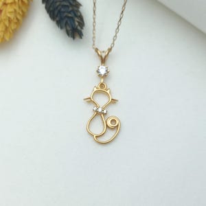 gold cat pendant, 14K cat necklace, gold cat charm, cute cat jewelry, feline figure necklace, gemstone cat pendant, playful cat charm