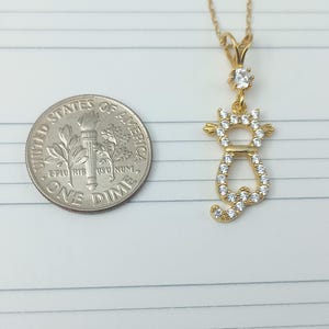 gold cat charm, cat love pendant, cat necklace, golden feline jewelry, playful cat pendant, charming kitty necklace, gold cat jewelry charm