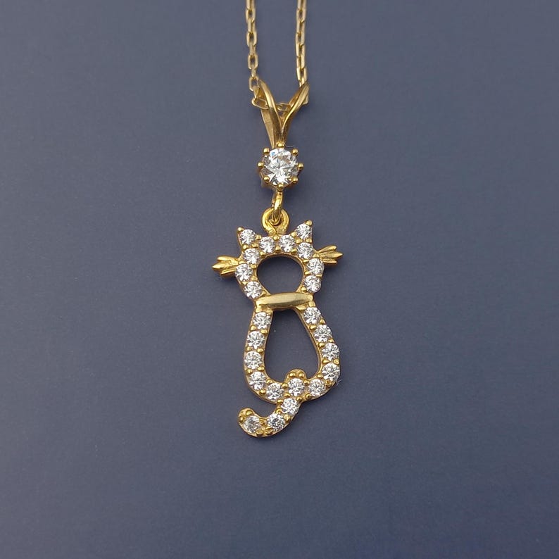 gold cat charm, cat love pendant, cat necklace, golden feline jewelry, playful cat pendant, charming kitty necklace, gold cat jewelry charm
