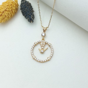 gold watch necklace, gold watch pendant, sparkling watch charm, gold timepiece necklace, elegant watch jewelry, dainty watch necklace
