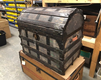 A Very Large Round Top Steamer Trunk made by DeVelling in the late 1800s