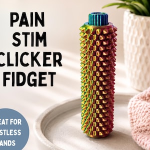 May include: A colorful, textured fidget toy with the words "PAIN STIM CLICKER FIDGET" and "GREAT FOR RESTLESS HANDS". The cylindrical toy has a ridged design with a blue top and a gradient of colors.