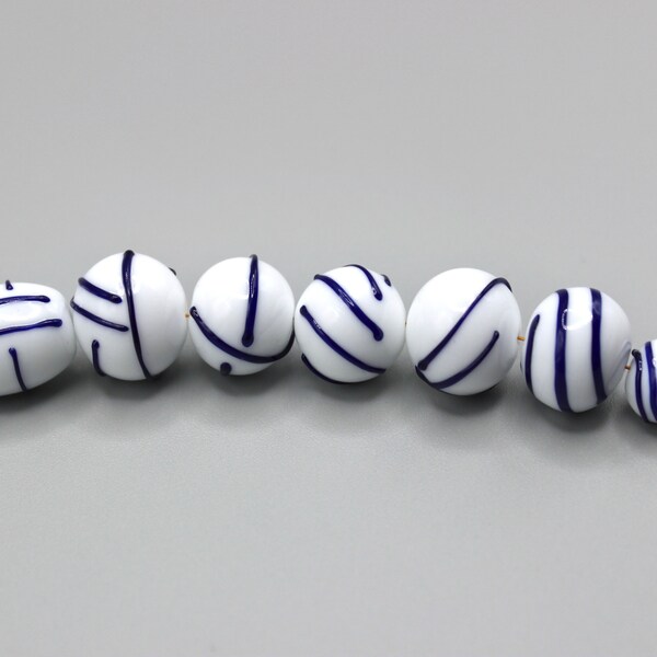 Lot Lampwork beads of 7 Blue and white graphic handmade pearls in torch-spun Murano glass