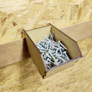 May include: A wooden wall-mounted organizer with a small compartment filled with silver screws.