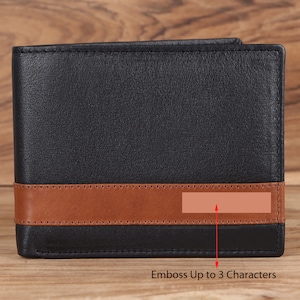 May include: Black leather wallet with a brown leather stripe and a space for up to 3 characters to be embossed. "Emboss Up to 3 Characters" is written below the wallet.