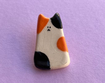 Pin de ceramica a forma de gato