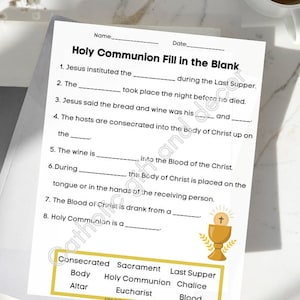 May include: A printable worksheet with a fill-in-the-blank quiz about Holy Communion. The quiz includes questions about the Last Supper, the Body of Christ, and the Eucharist. The worksheet has a gold chalice with a cross on top.