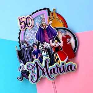 May include: A colorful cake topper featuring Disney villains, the number 50, and the name "Maria". The design includes characters like Maleficent and the Evil Queen, set against a pink and blue background. A castle silhouette is also included.
