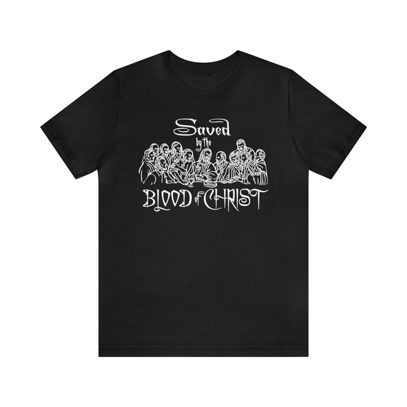 May include: Black t-shirt with a white graphic of the Last Supper and the text "Saved by the Blood of Christ".