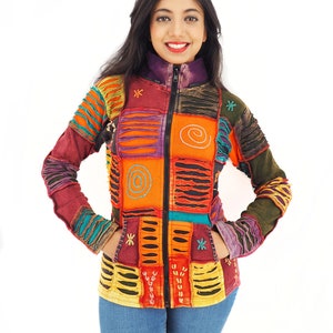 May include: A colourful patchwork jacket with a zip fastening. The jacket is made from different fabrics and has a variety of colours, including red, orange, yellow, green, blue, and purple. The jacket has a distressed look and features various embroidery details.