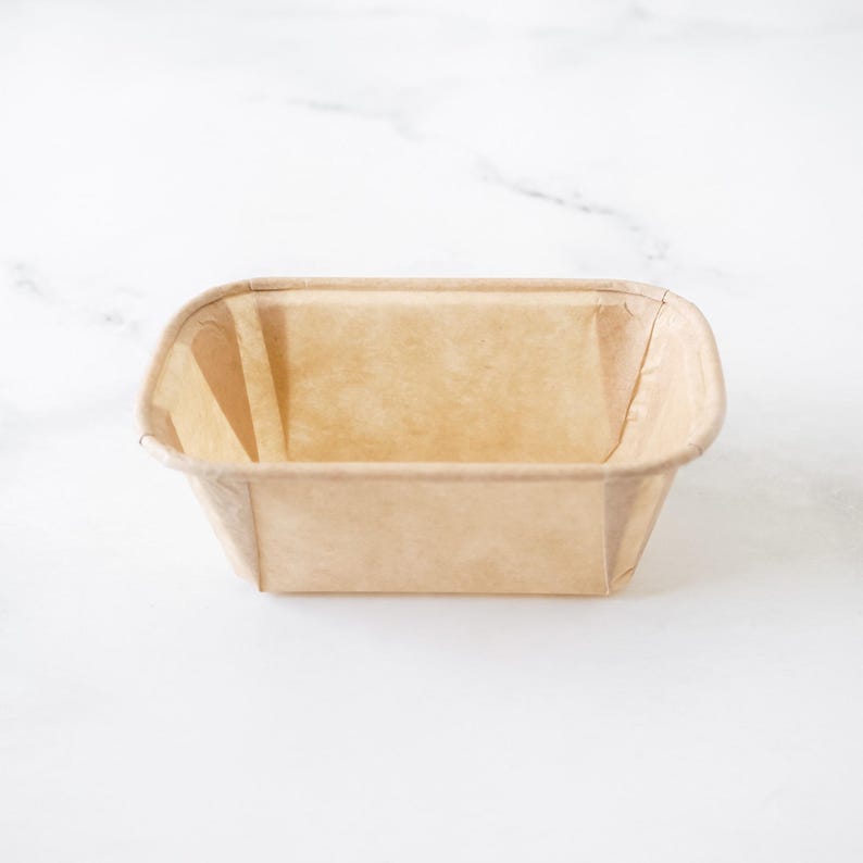 Kraft rectangular paper baking pan on a white background