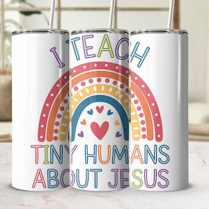 May include: Three white stainless steel tumblers with a rainbow design and the text "I teach tiny humans about Jesus".