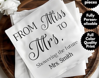 May include: White napkins with black text that reads "FROM Miss TO Mrs." and "Showering the future Mrs. Smith." The napkins are stacked on a wooden tray. The image also includes text that says "Set of 50 pieces", "Fully Personalizable", and "Full Color Quality Print."