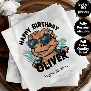 May include: A set of 50 white paper napkins with a cartoon dinosaur wearing sunglasses and a blue jacket. The text "HAPPY BIRTHDAY OLIVER August 31, 2025" is printed on the napkin.