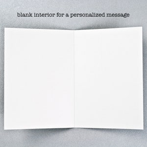 May include: Blank white card with the text "blank interior for a personalized message" printed on the front.