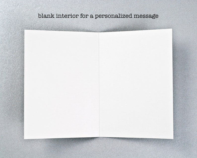 May include: Blank white card with the text "blank interior for a personalized message" printed on the front.