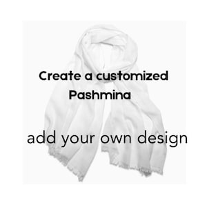 May include: A white pashmina scarf with a fringed edge, draped and displayed against a white background. The text "Create a customized Pashmina add your own design" is overlaid on the image.