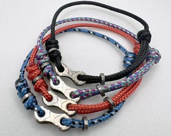 Pulsera de paracord ajustable con eslabones de cadena de bicicleta usada KMC Silver de 11 velocidades reciclada