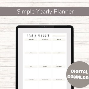 Könnte beinhalten: Ein digitaler Download eines einfachen Jahresplaners auf einem Tablet-Bildschirm. Der Planer ist in 12 Monate unterteilt, wobei jeder Monat seinen eigenen Abschnitt hat. Der Planer ist in Schwarzweiß mit einem einfachen Design.