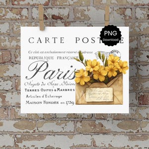 Puede incluir: Un cartel de estilo vintage con la palabra "París" en escritura elegante, texto en francés y una ilustración en acuarela de flores amarillas en un sobre. El cartel está suspendido por pinzas de madera.