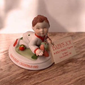 Holly Hobbie Baby&#39;s First Christmas Porcelain  Figurine Baby With Toys Limited Edition From 1982 By American Greetings Collectible Decor