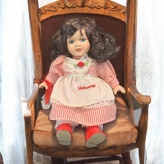 Vintage February Porcelain Doll: Brunette Hair, Red Striped Dress
