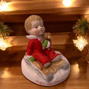 Holly Hobbie Baby&#39;s First Christmas Porcelain Figurine Baby On Sled Limited Edition Of 24000 From 1980 Collectible Holiday Decor