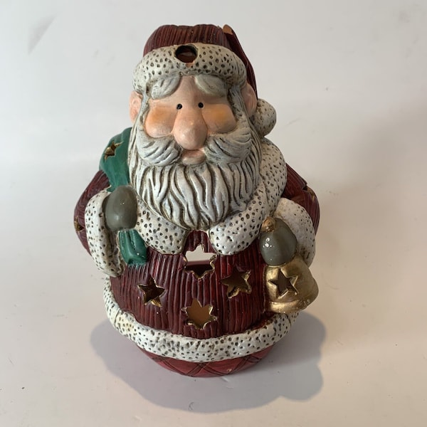 Vintage Terra Cotta Santa Claus Figurine Candleholder Seasonal Christmas Decoration With Star Cutout Pattern Or Design