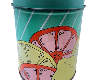Vintage citrusskivor liten rund plåtburk 13,5 cm x 10 cm grön randig med fruktdesign