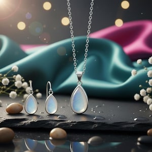 Rainbow Moonstone Jewelry Set Sterling Silver Pear Pendant & Earrings  Blue Flash Moonstone Gift June Birthstone Set Dainty Handmade Moonstone Set Sterling Silver Hook Earrings & Pendant June Birthday Gift for Her Minimalist Celestial Jewelry 925 Sterling Silver Moonstone Earring & Necklace Set  Natural Pear Cut Gemstone Jewelry Blue Flash June Birthstone Gift