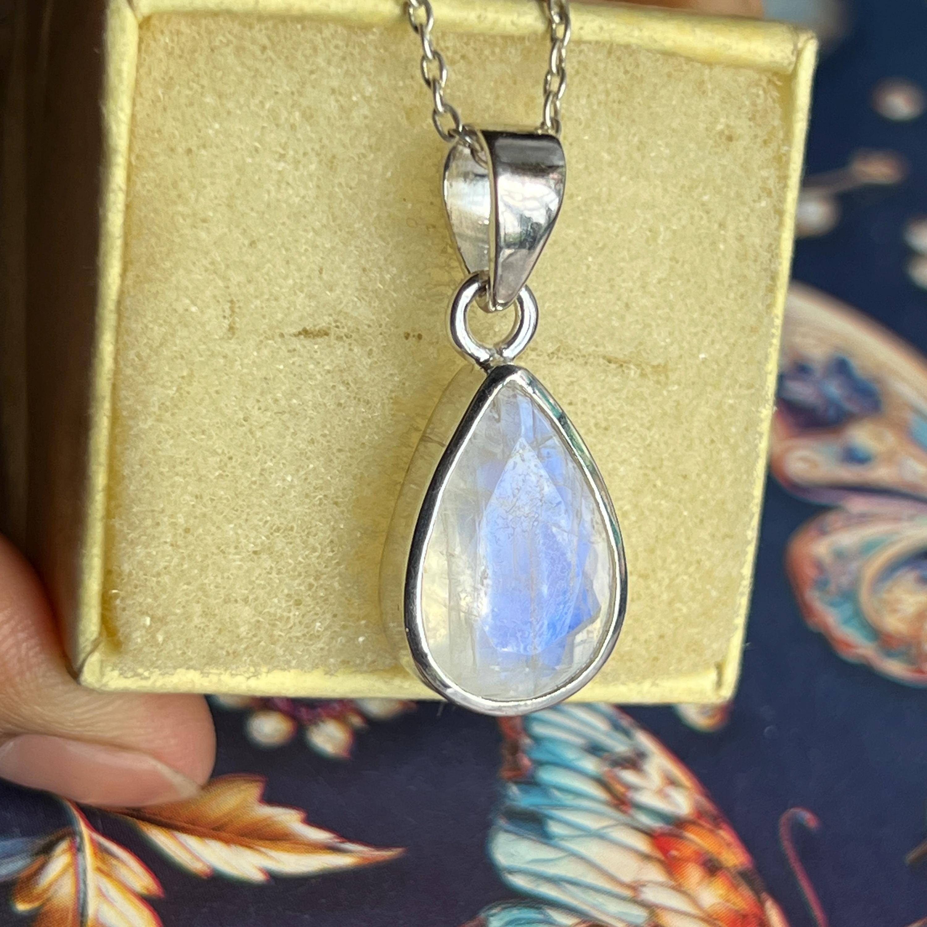 thumbnail interactive-video image 1 of Rainbow Moonstone Crystal Angel Pendant With 20" Stainless Steel Chain & Charger Gift 1 of 5