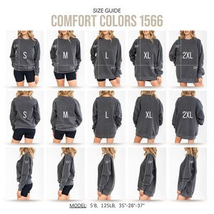 May include: Size guide for Comfort Colors 1566 sweatshirts, showing the fit of sizes S, M, L, XL, and 2XL on a model. The model is 5'8" and 125 lbs, wearing a size L.